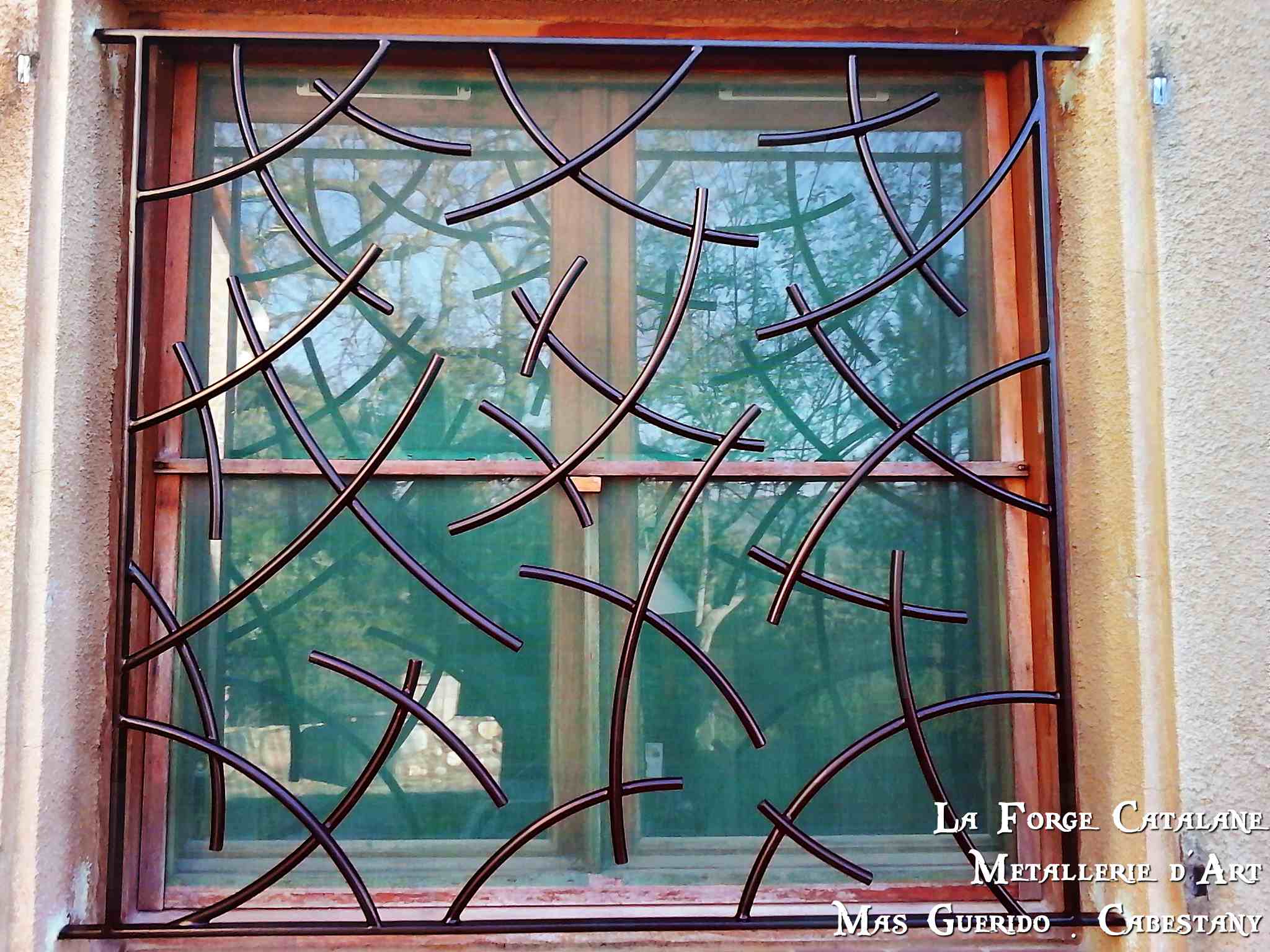 grille protection destructure moderne cintre forge catalane.jpg